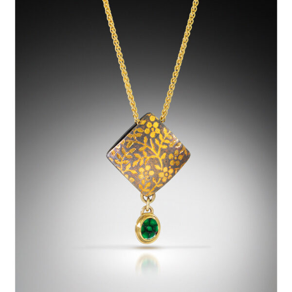 Square pillow pendant with gold flowers and small emerald drop