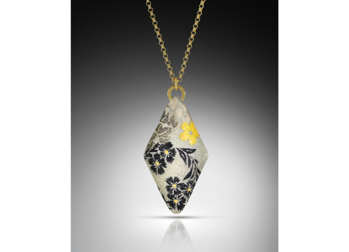 Diamond shape enamel necklace with green and black flowers