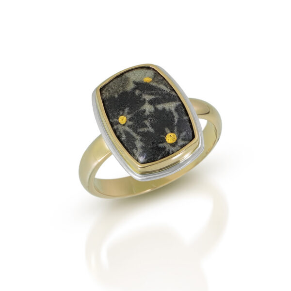 Green enamel rectangle with black flowers and gold dots in gold ring