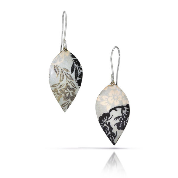 green black and cream flowers on petal shaped enamel earrings