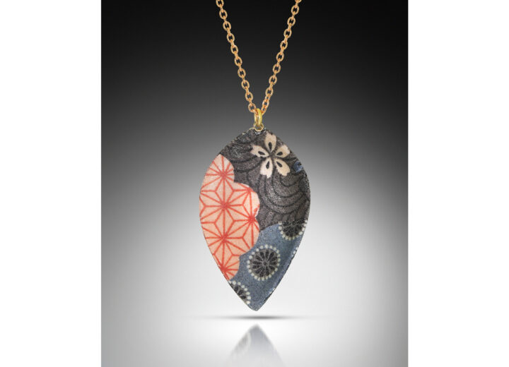 Pink black and blue enamel pendant in shield petal shape