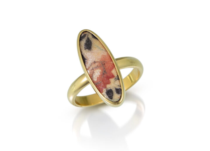 Long oval enamel rose with gold bezel and gold band ring