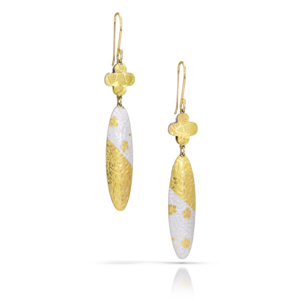 White and gold long dangle earrings with quatrefoils and ovals