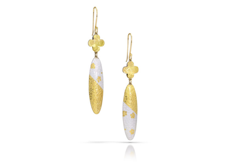 White and gold long dangle earrings with quatrefoils and ovals