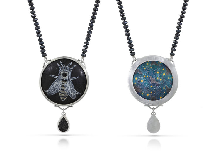 Front and back view of round enamel with black and white honeybee and druzy teardrop on onyx bead necklace