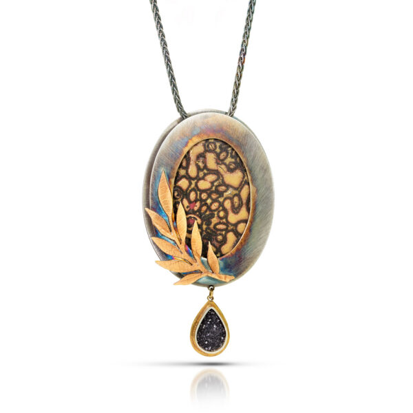 Oval pendant with gold enamel in silver frame with gold frond and black druzy teardrop