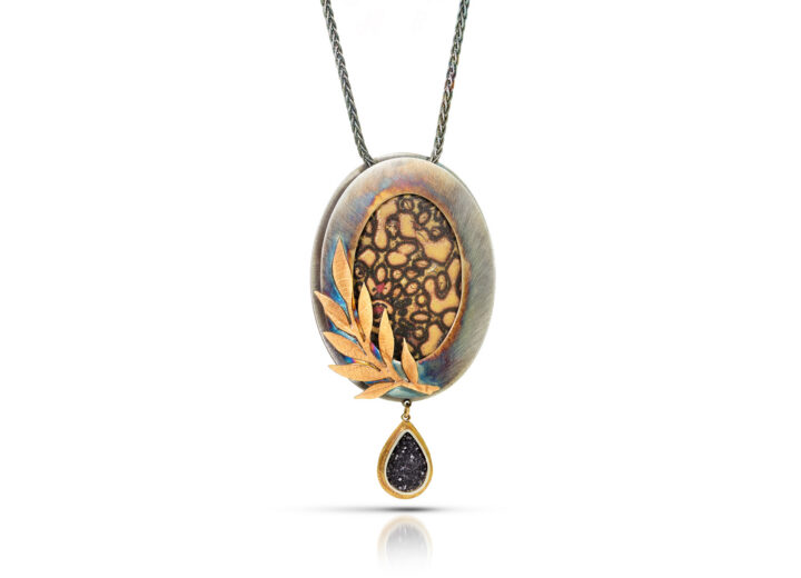 Oval pendant with gold enamel in silver frame with gold frond and black druzy teardrop