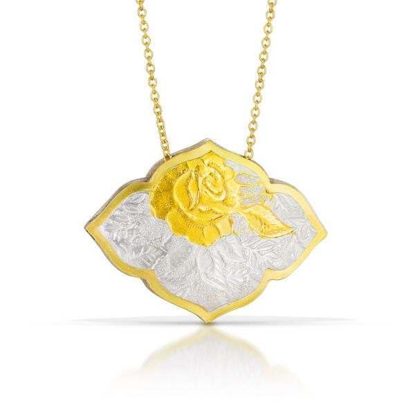Horizontal fancy quatrefoil pendant with gold and silver rose pattern