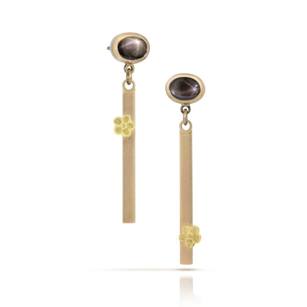 Oval brown star sapphire studs in gold with bar drops and flowers